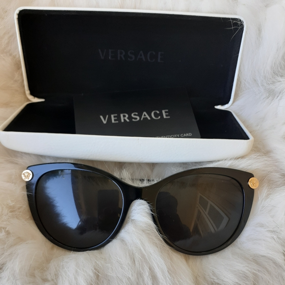 Authentic Versace ladies cat eye sun glasses.